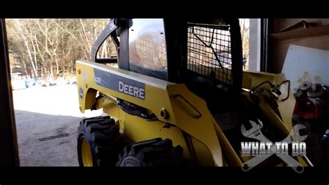 jd 320 skid steer tilt pedal stuck to floor|john deere 328 skid steer stuck.